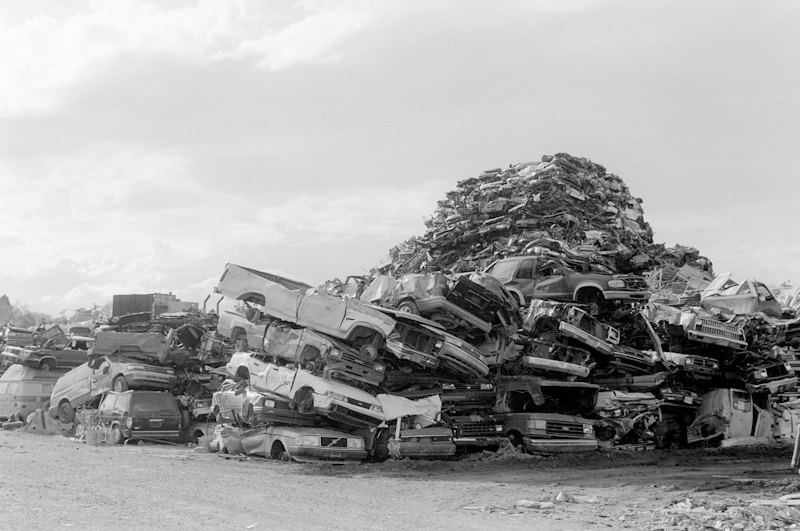 Wrecked and damaged cars in a salvage yard